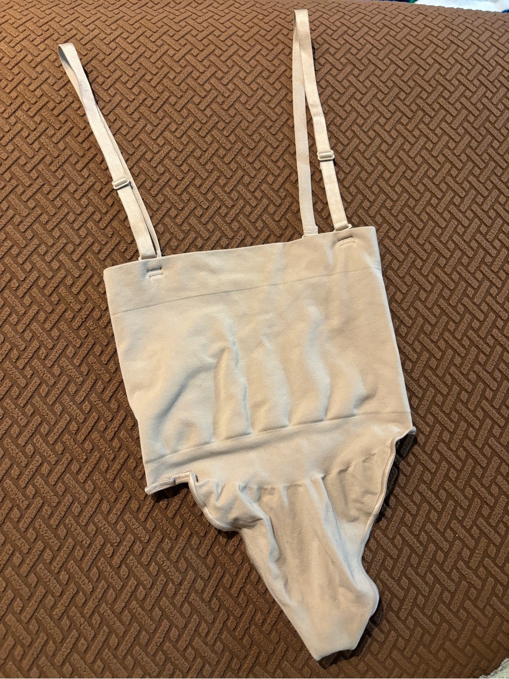 SKIMS Light Beige Shaping Thong Bodysuit with Adjustable Straps